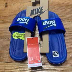 Blue boys Nike slides